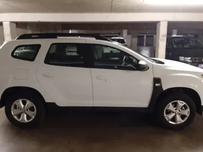 Używany Dacia Duster Comfort 101 KM (74 kW) 2021 Biały SUV
