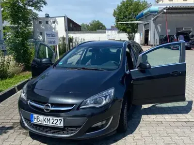 Gebraucht Opel Astra Style 140 PS (102 kW) 2014 Schwarz Kombi