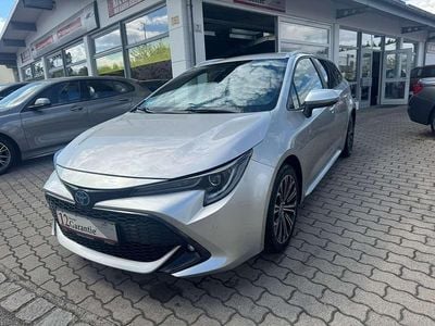 Second-hand Toyota Corolla Hybrid Team 152 CP (111 kW) 2022 Argintiu Break