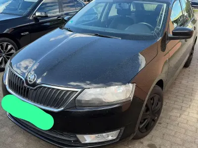 Używany Skoda Rapid 90 KM (66 kW) 2014 Czarny Hatchback