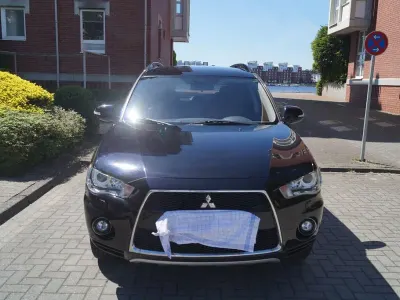 Gebraucht Mitsubishi Outlander 147 PS (108 kW) 2011 Schwarz SUV