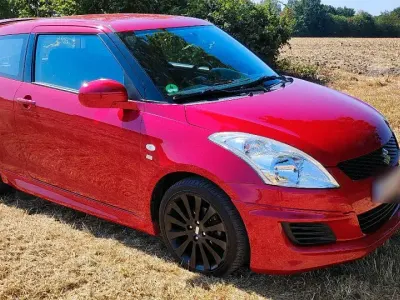 Gebraucht Suzuki Swift 95 PS (69 kW) 2012 Rot Kleinwagen
