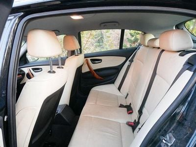 Second-hand BMW 118 143 CP (105 kW) 2009 Negru Hatchback