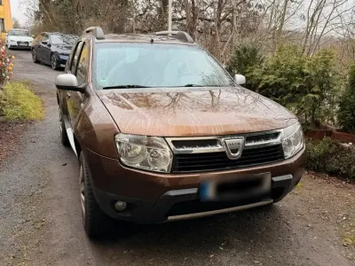 Używany Dacia Duster 105 KM (77 kW) 2011 Brązowy SUV