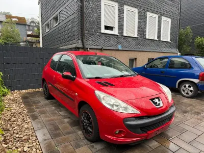 Gebraucht Peugeot 206+ 68 PS (50 kW) 2011 Rot Kleinwagen