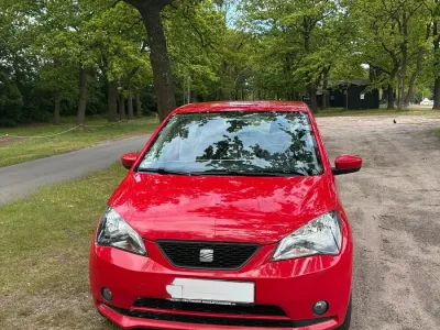 Używany Seat Mii 60 KM (44 kW) 2013 Czerwony Hatchback