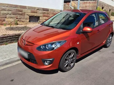 Gebraucht Mazda 2 102 PS (75 kW) 2009 Orange Kleinwagen