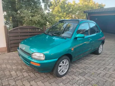 Gebraucht Mazda 121 72 PS (52 kW) 1994 Grün Limousine