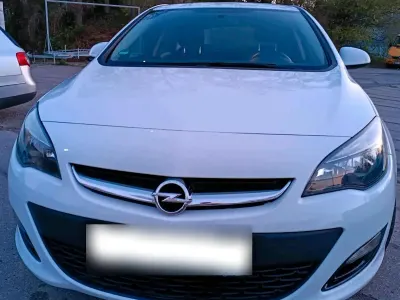 Usata Opel Astra 115 CV (84 kW) 2014 Bianco Utilitaria