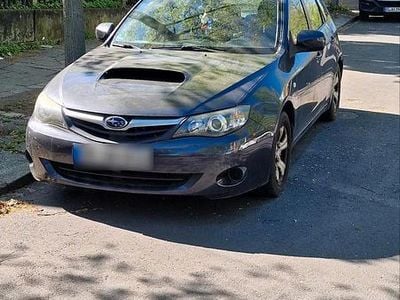 Używany Subaru Impreza 150 KM (110 kW) 2011 Czarny Sedan/Limuzyna