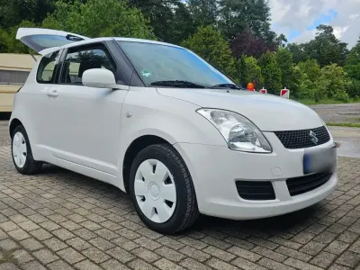 Gebraucht Suzuki Swift 90 PS (66 kW) 2010 Weiß Kleinwagen