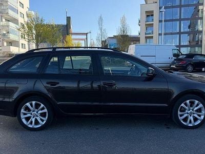 Second-hand Skoda Superb Active 125 CP (91 kW) 2014 Maro Break