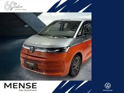 Gebraucht VW Multivan Style 150 PS (110 kW) 2025 Monosilber/ energetic orange Van / Kleinbus