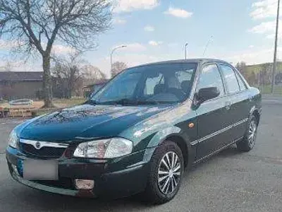 Second-hand Mazda 323 88 CP (64 kW) 1998 Verde Berlinǎ