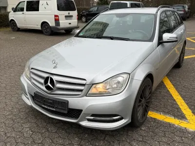 Używany Mercedes C220 170 KM (125 kW) 2011 Srebrny Kombi