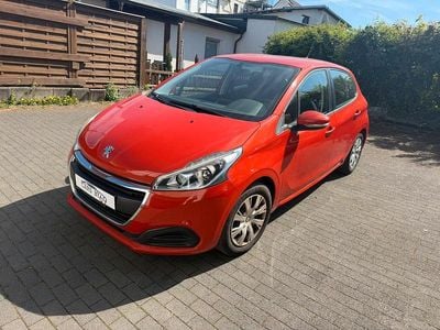 Gebraucht Peugeot 208 82 PS (60 kW) 2015 Orange Kleinwagen