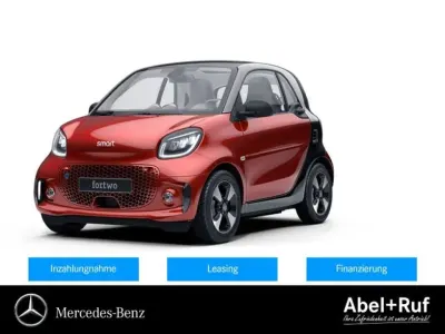 Gebraucht Smart ForTwo Electric Drive Passion 60 kW (82 PS) 2024 Bodypanels in carmine red (metal (metallic) Coupé