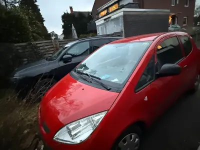 Gebraucht Mitsubishi Colt 75 PS (55 kW) 2008 Rot Kleinwagen