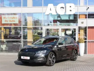 Gebraucht Skoda Octavia SportLine 210 PS (154 kW) 2023 Cerna magic/black magic (metallic) Kombi