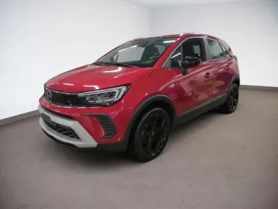 Gebraucht Opel Crossland X Elegance 110 PS (80 kW) 2023 Lackierung peperoncino red/metal (metallic) SUV