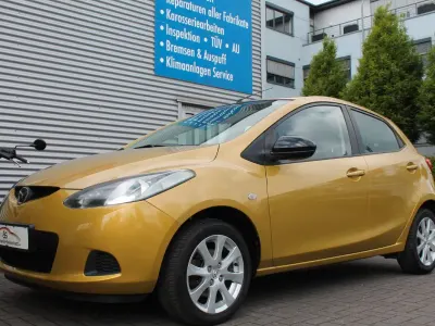 Gebraucht Mazda 2 Independence 75 PS (55 kW) 2007 Ambrosiagelb metallic Kleinwagen