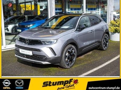 Gebraucht Opel Mokka-e Ultimate 100 kW (136 PS) 2023 Kontrast grau metallic SUV