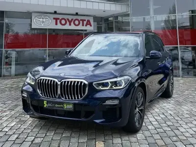 Gebraucht BMW X5 M Sport 400 PS (294 kW) 2021 Tansanitblau ii metallic (metallic) SUV