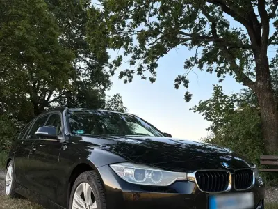Gebraucht BMW 320 Sport Line 184 PS (135 kW) 2013 Schwarz Kombi
