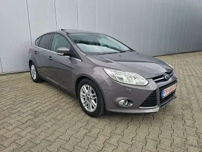 Używany Ford Focus Champions Edition 125 KM (91 kW) 2012 Brązowy Sedan/Limuzyna