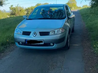 Używany Renault Mégane II 113 KM (83 kW) 2004 Srebrny Sedan/Limuzyna