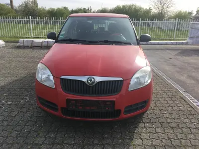 Używany Skoda Fabia 69 KM (50 kW) 2010 Czerwony Kombi