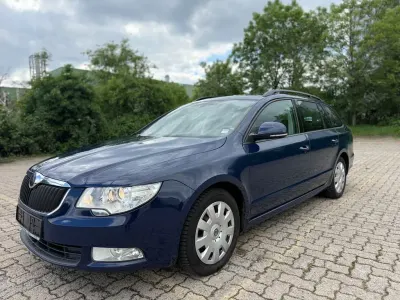 Używany Skoda Superb 140 KM (102 kW) 2010 Niebieski Kombi