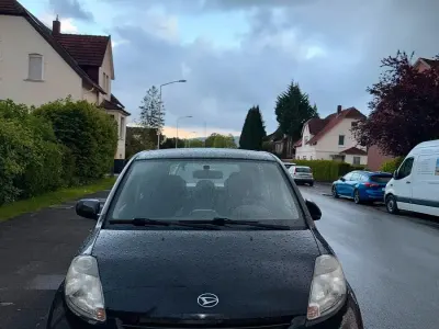 Gebraucht Daihatsu Sirion 91 PS (66 kW) 2008 Schwarz Kleinwagen