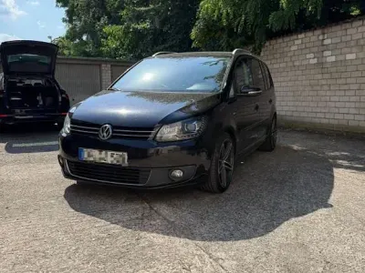 Gebraucht VW Touran Cup 140 PS (102 kW) 2014 Schwarz Van / Kleinbus