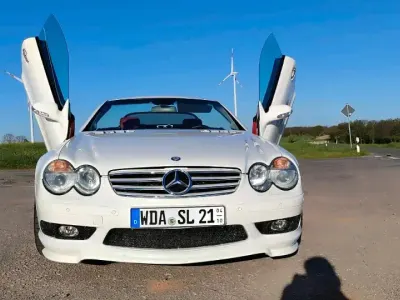 Używany Mercedes SL55 AMG AMG 500 KM (367 kW) 2003 Biały Kabriolet