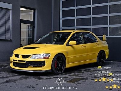 Second-hand Mitsubishi Lancer 265 CP (194 kW) 2013 Galben Berlinǎ