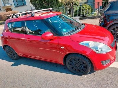 Second-hand Suzuki Swift 94 CP (69 kW) 2012 Roșu Hatchback