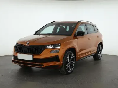 Second-hand Skoda Karoq SportLine 150 CP (110 kW) 2024 Portocaliu SUV