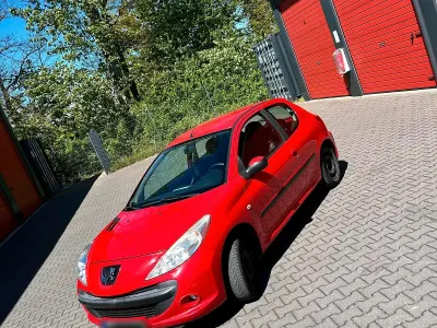Gebraucht Peugeot 206+ 68 PS (50 kW) 2010 Rot Kleinwagen