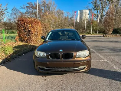 Usado BMW 116 122 CV (89 kW) 2011 Marrón Utilitario