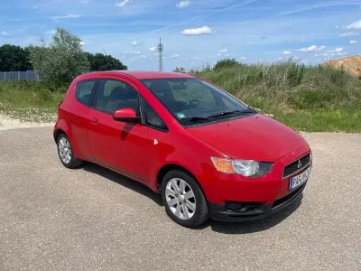 Gebraucht Mitsubishi Colt Top 95 PS (69 kW) 2011 Rot Kleinwagen