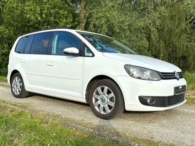 Gebraucht VW Touran Comfortline 140 PS (102 kW) 2014 Pure white Van / Kleinbus