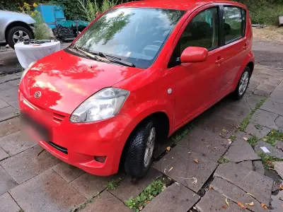 Gebraucht Daihatsu Sirion 91 PS (66 kW) 2009 Rot Kleinwagen