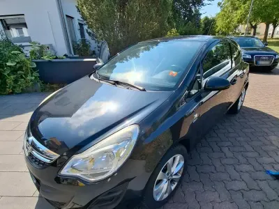 Gebraucht Opel Corsa Active 70 PS (51 kW) 2013 Schwarz Kleinwagen