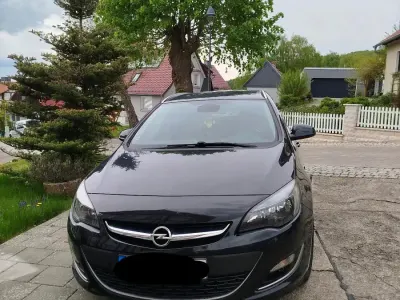 Używany Opel Astra 110 KM (80 kW) 2015 Czarny Kombi
