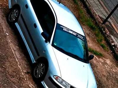 Occasion Mitsubishi Carisma 122 PK (89 kW) 2002 Zilver Sedan