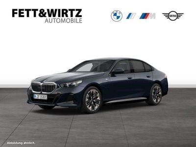 Gebraucht BMW 550e M Sport 489 PS (359 kW) 2024 Carbonschwarz metallic metallic Limousine