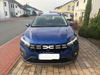 Gebraucht Dacia Sandero Expression 101 PS (74 kW) 2024 Blau Limousine