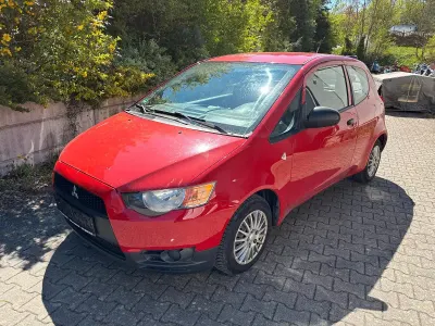 Gebraucht Mitsubishi Colt Basis 75 PS (55 kW) 2009 Rot Kleinwagen