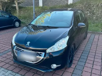 Gebraucht Peugeot 208 68 PS (50 kW) 2012 Schwarz Kleinwagen